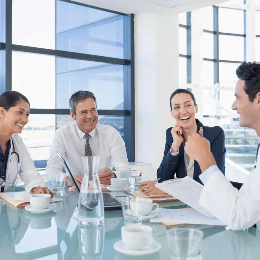 Healthcare team of doctors and public health professionals in meeting